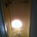 Nasty fiberglass shower in downstairs bathroom